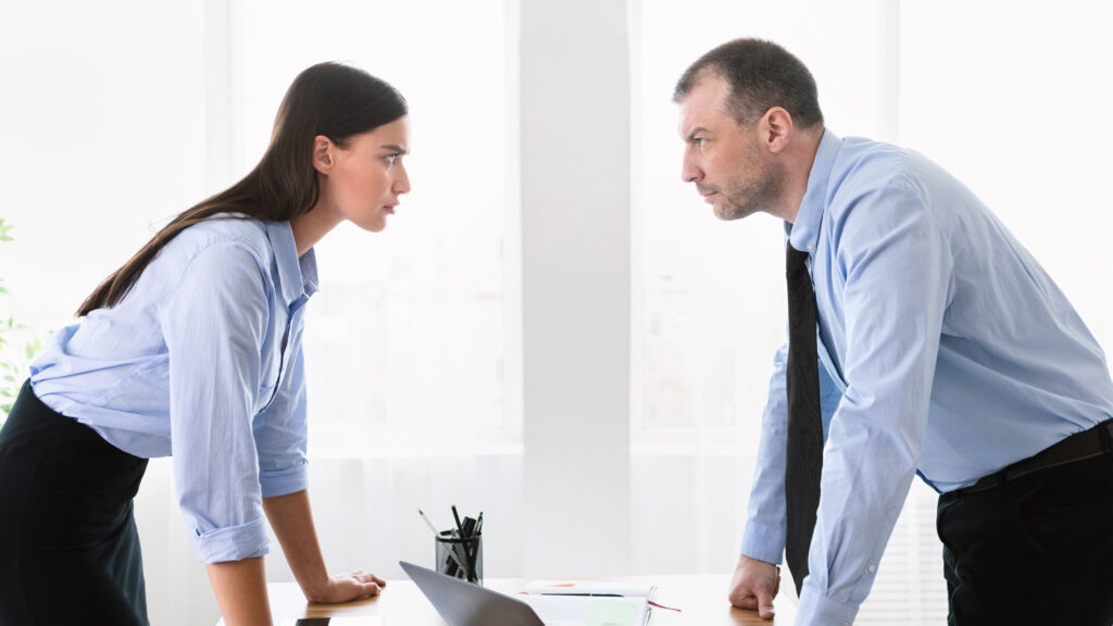 people having a conflict at work