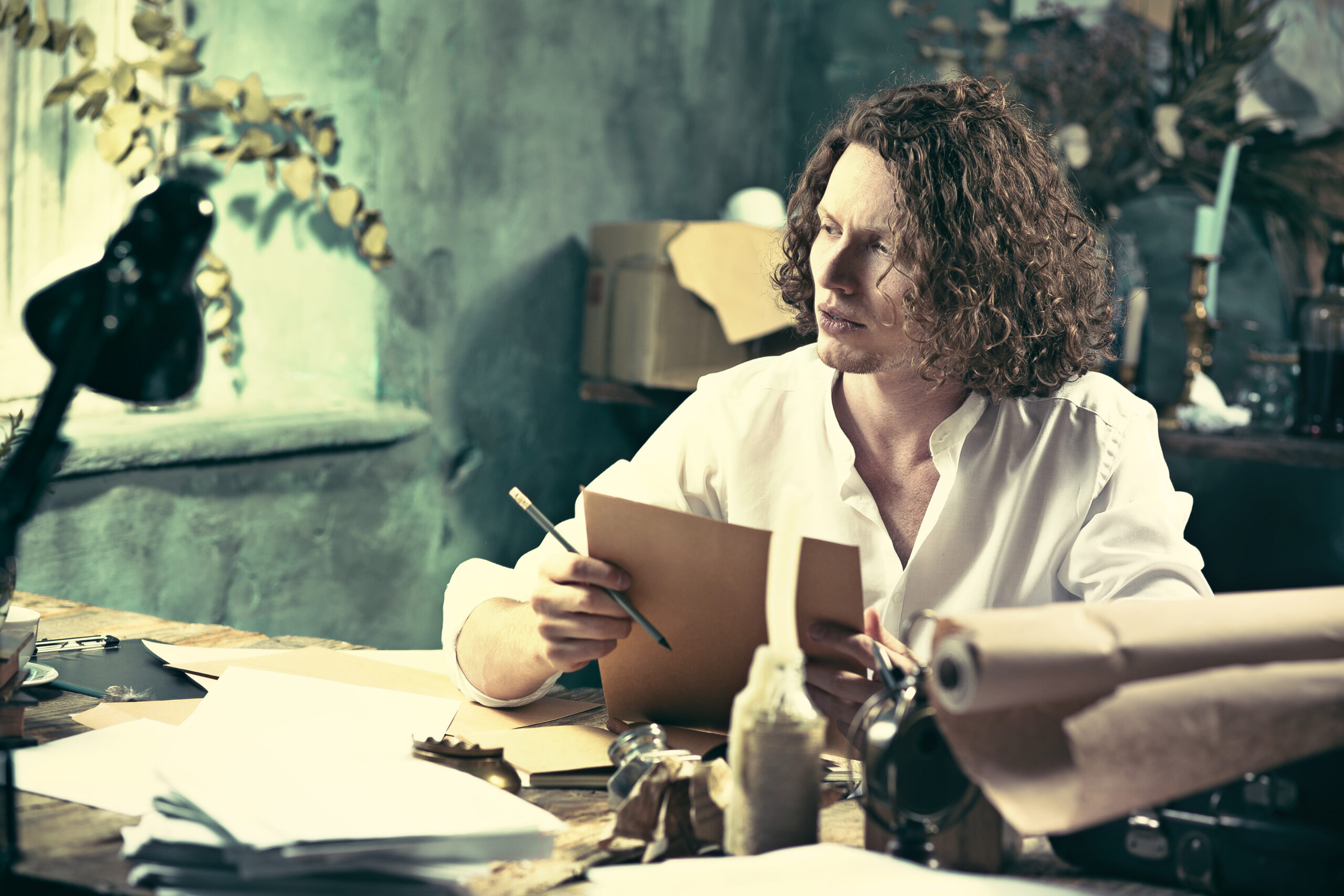 writer sitting at his desk